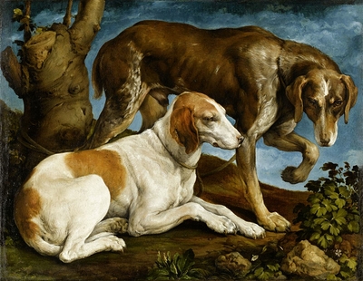 Deux chiens de chasse attachés à une souche