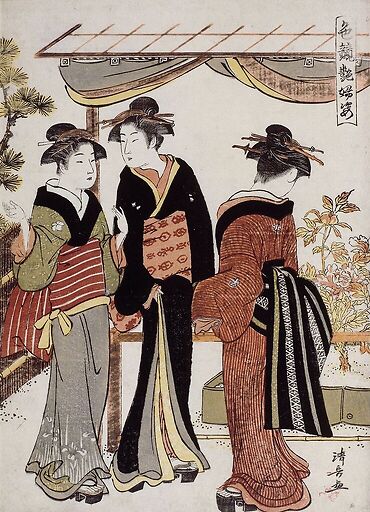 Femmes admirant des pivoines en fleurs