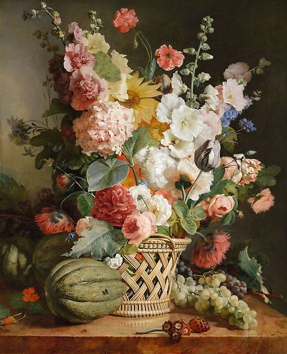 Fruits et fleurs dans une corbeille d’osier