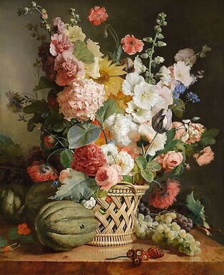 Fruits et fleurs dans une corbeille d’osier