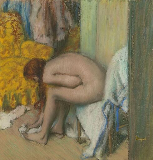 Nude woman wiping her left feet. A woman at her toilet