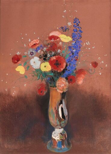 Bouquet de fleurs des champs dans un vase à long col