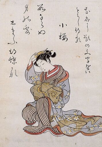 Young woman staring at a comb in her hair