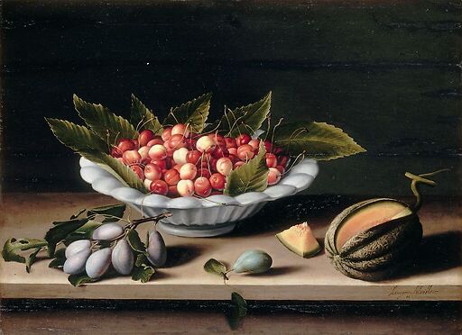 Cup of cherries, plums and melon