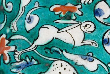 Dish decorated with lion, hares and fantastic animals on a green background I/II