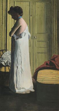 Nude in an interior, woman taking off her shirt