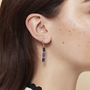 Boucles d'oreilles pendantes antiques avec pierres bleues