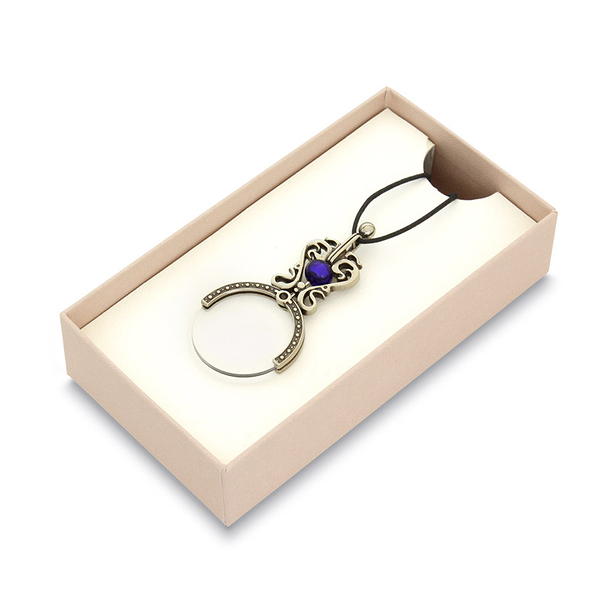 Loupe tour de cou avec perle bleue