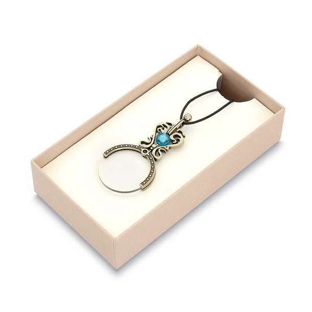 Loupe tour de cou avec perle bleue claire