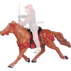 Figurine Le cheval fauve au harnachement rouge