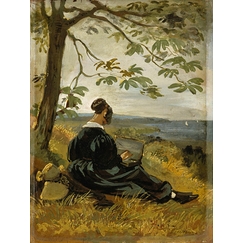 Young woman drawing under a tree