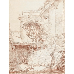 Woman hanging laundry in a courtyard