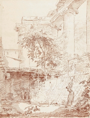 Woman hanging laundry in a courtyard