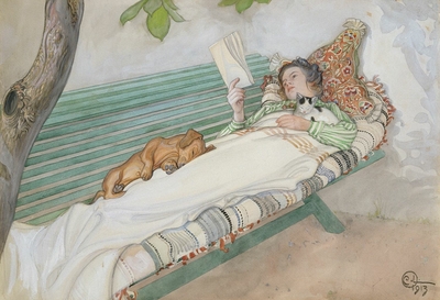 Young woman lying on a bench
