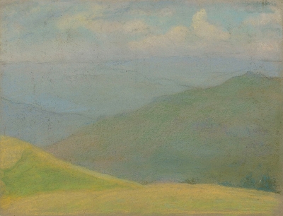 Mountain landscape with yellow meadow in the foreground