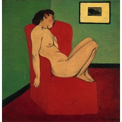 Naked woman sitting in a red armchair