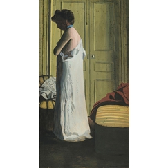 Nude in an interior, woman taking off her shirt