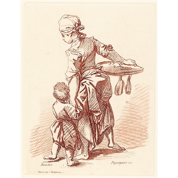 Woman holding a child by the hand